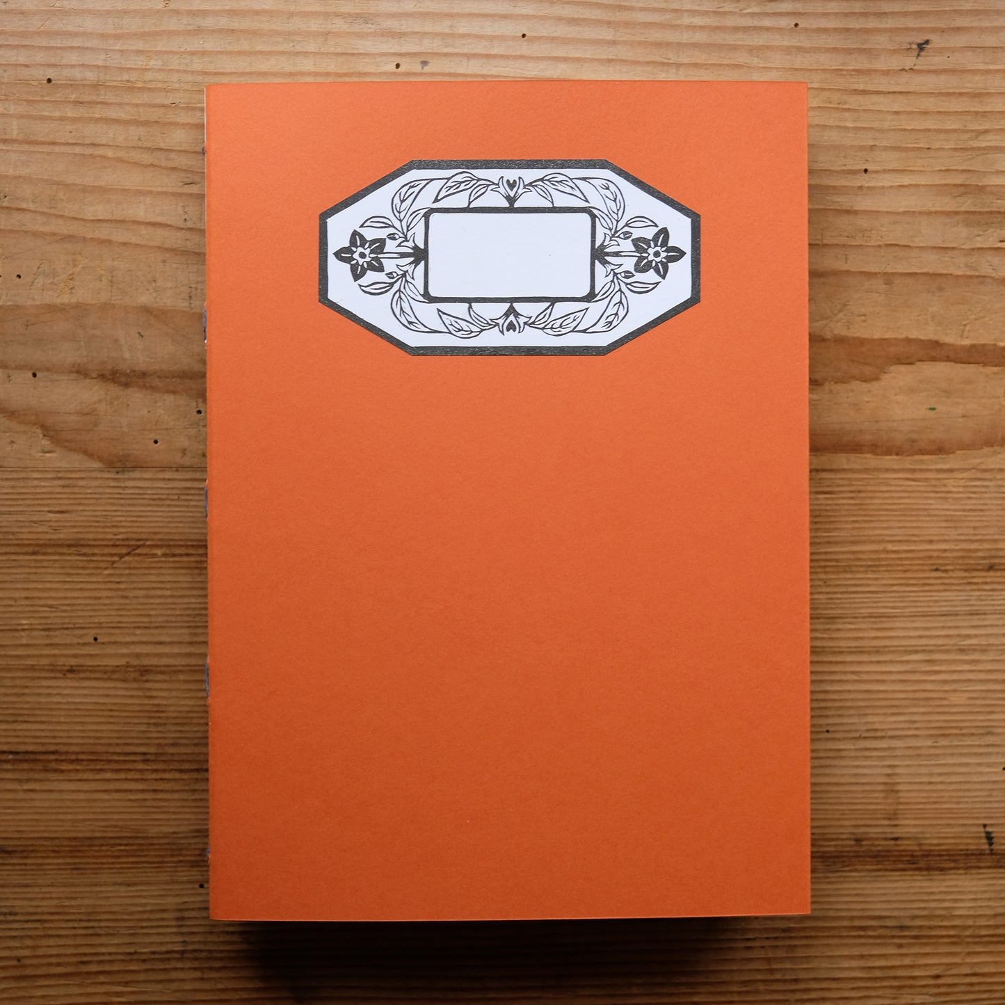 Hand Stitched Softcover Book with Lino Printed Label