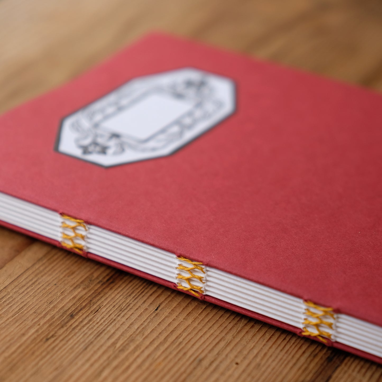 Hand Stitched Softcover Book with Lino Printed Label