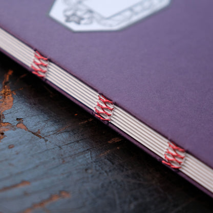 Hand Stitched Softcover Book with Lino Printed Label